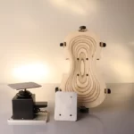 <p>Piastra di supporto per controforma violino con dado filettato avvitabile all'albero del posizionatore.</p>